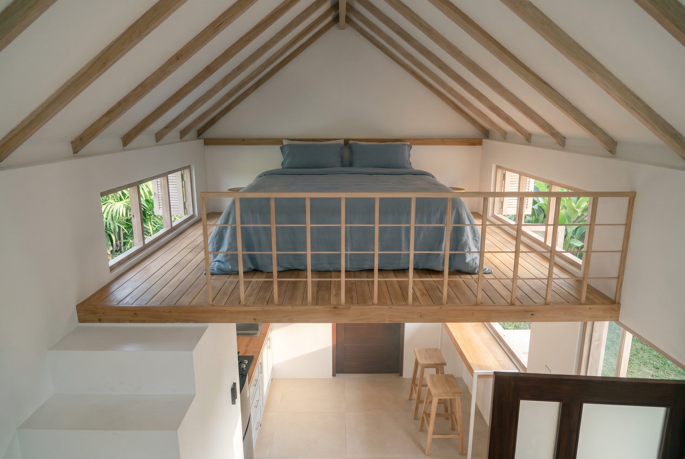 Loft bedroom under the roof beams